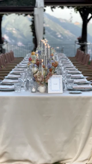 All the pastels you could ever dream of 🪻

Set in the gardens of Villa Eva, Antonia & Jeffrey’s wedding dinner felt like a romantic painting: delicate pastel florals, refined glassware, and candlelight that accompanied the evening with elegance and unmistakable Italian charm!🕯️✨
And that view? Amalfi Coast doing what Amalfi Coast does best! 

Planning & production : @esterchianelli_iwa
Wedding coordinator : @alessandra_silenziario
Venue : @villaevaravello
Florist : @malafrontefiori
Forniture & setup : @fgeventi
Music : @fabiovuotto
Lights : @antares_events
Photographer : @vincenzo_grillo
Printing : @albanodigital
Content : @raffaellaferrigno

\\ WHATEVER YOUR HEART DESIRES, WE’LL MAKE IT HAPPEN \\

|| Ester Chianelli Italian Wed Agency ||

📱3806966342
💻 www.esterchianelli.com
📧 info@esterchianelli.com 

#amalficoastwedding #ravellowedding #italianwedding #destinationweddingitaly #italianweddingplanner #weddingvenueitaly #italywedding
